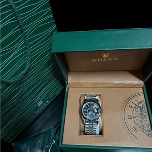 Silver Timepiece with Black Dial